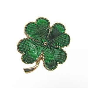 Four leaf clover green pin brooch in shiny green enamel and gold trim stem